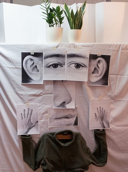 Portrait assembled from printed photographs
